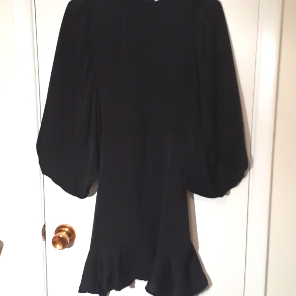 Black silky mini dress with ruffled bottom